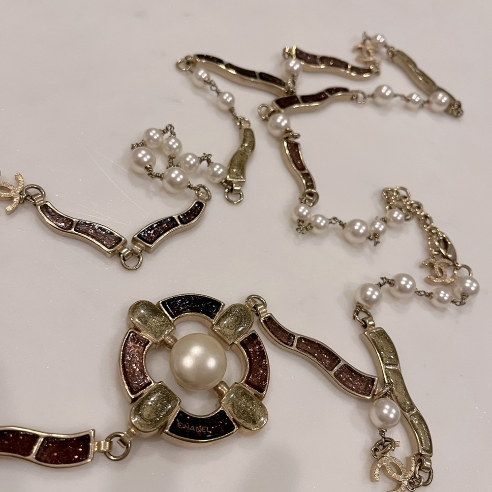 Authentic CHANEL glazed purple, gold, and pearl long medallion long necklace